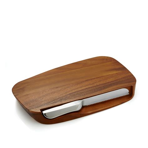 ✓ Nambe - Serveware Collection - Blend Bread Board with Knife - Measures at 17.5" x 11" x 2" - Made with Acacia Wood and Nambe Alloy - Designed by Neil Cohen